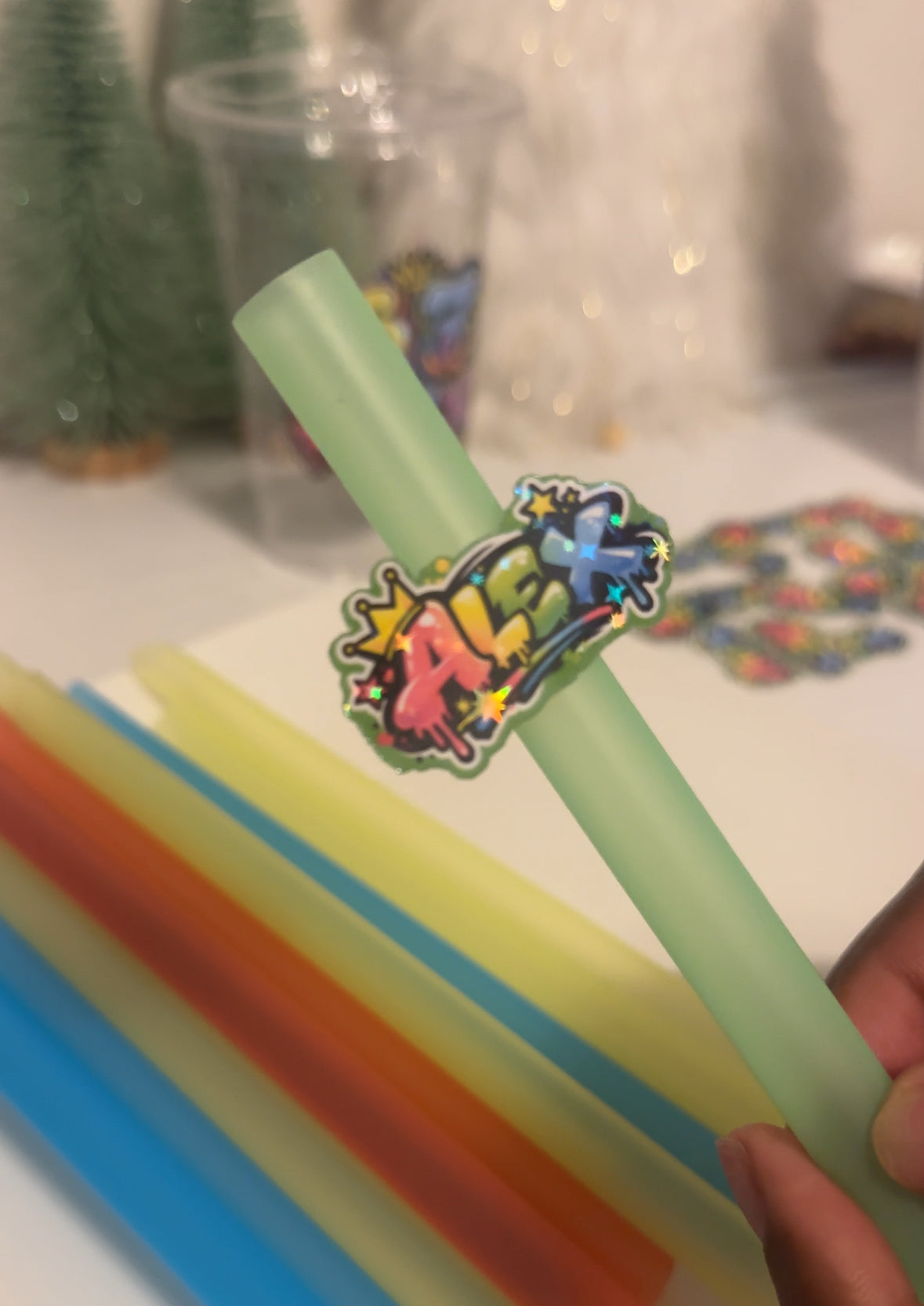 Custom straw toppers on plastic boba straws